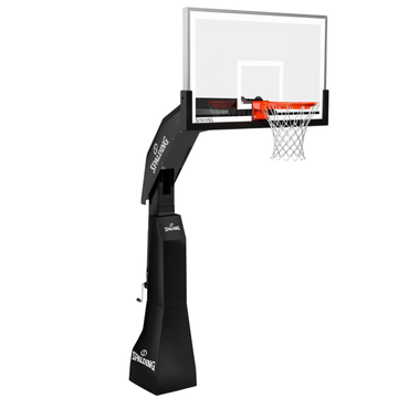 Spalding arena renegade in-ground basketball hoop with clear backboard and adjustable height for backyard use.
