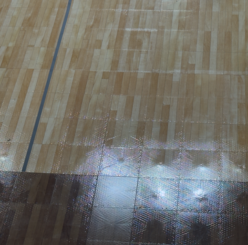 Portable Enlio FIBA-Approved Wood Pattern Basketball Court Tiles – 56' x 100' NCAA Full Court