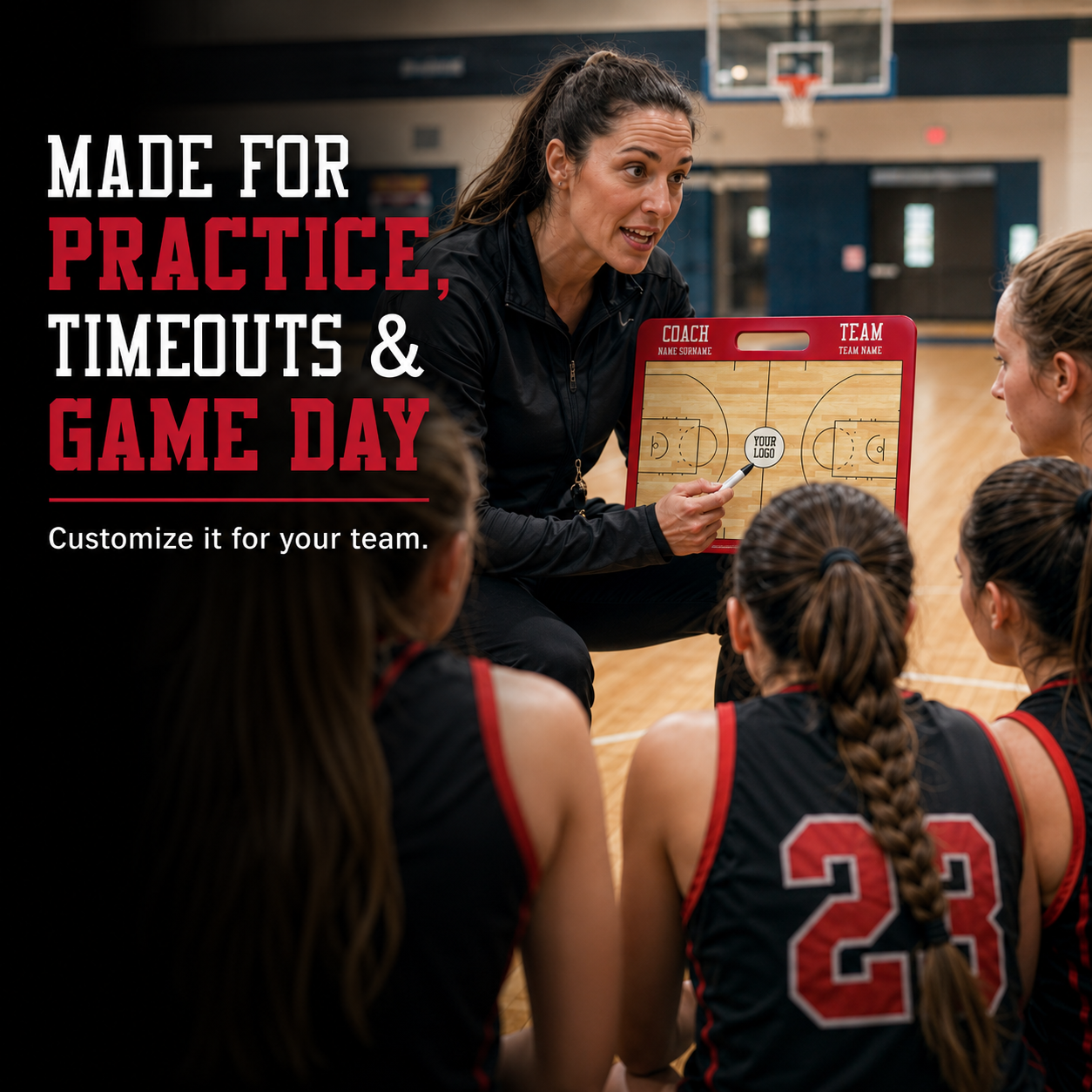 Female basketball coach using the customized WNBA magnetic coaching board during practice, timeout and game day with her team