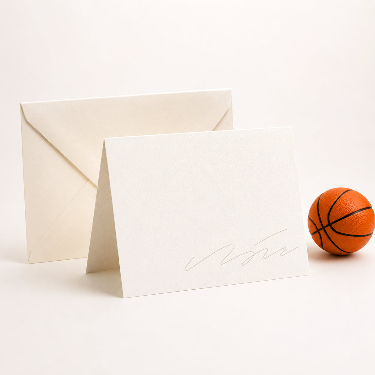 Handwritten gift note - cream greeting card with handwritten message, cream envelope, basketball gift context